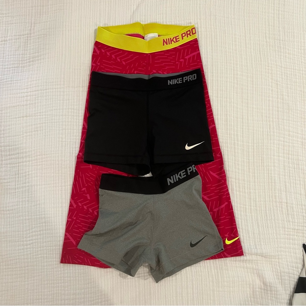 Nike Pro Shorts Trio in Black, Gray, and Pink